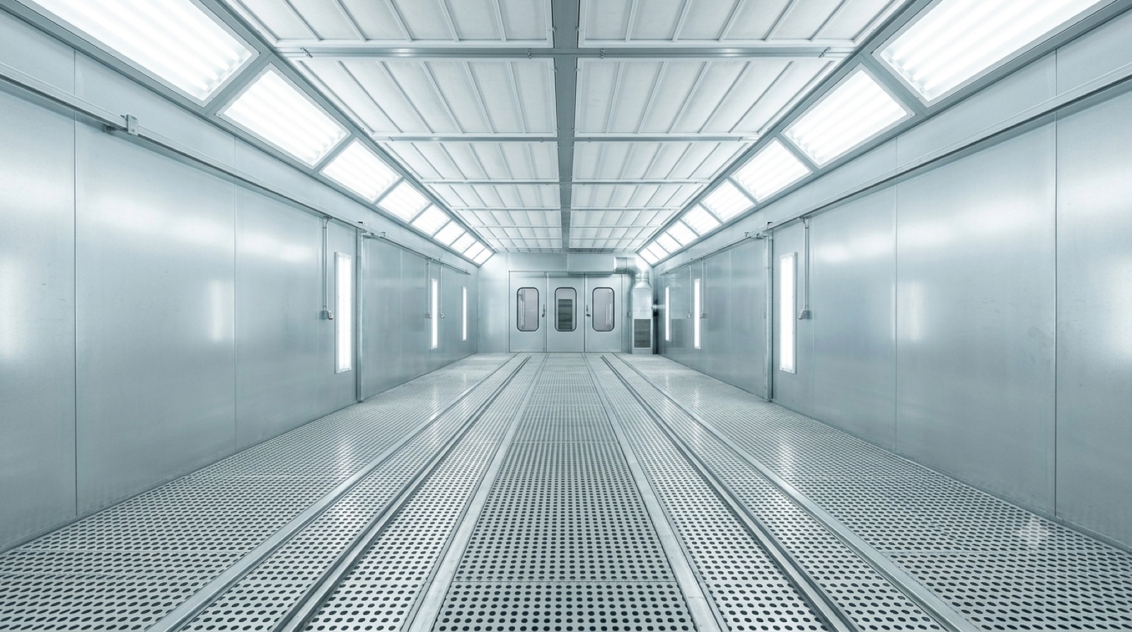 Spray booth interior with glowing ceiling filters